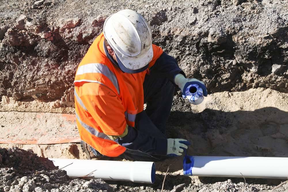 Photos estate lays pipes for NBN fibre Collaboration