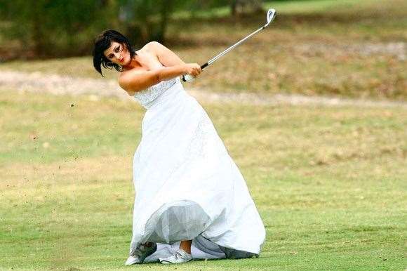 GolfDress No big-day nerves for “Bride” Polly Travica.