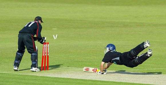 Hampshire’s Simon Katich is almost caught short at the Rose Bowl in 2003. 
