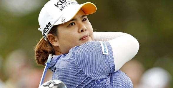 Inbee Park of South Korea tees off on the 2nd hole during the final round of the 2013 U.S. Women's Open golf championship at the Sebonack Golf Club in Southampton