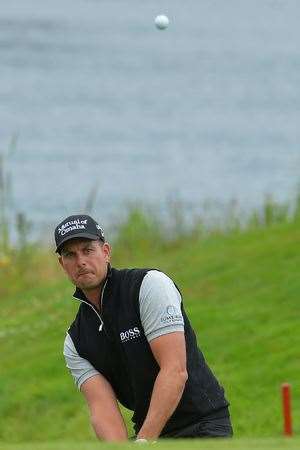 Henrik Stenson chips onto the 17th green on the fourth hole of the play-off with Zanotti. PHOTO: Getty Images