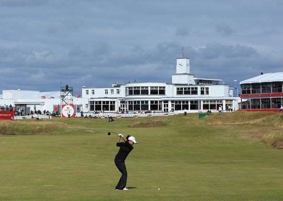 Mo Martin hits her second shot on the par-5 18th hole to set up an eagle finish. PHOTO: Getty Images