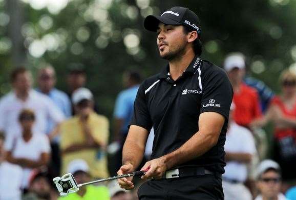 Jason Day reacts after missing a birdie putt on the 9th hole during the final round. PHOTO: Getty Images