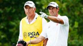 Williams with Scott at the PGA Championship, which turned out to be their final major together. PHOTO: Getty Images