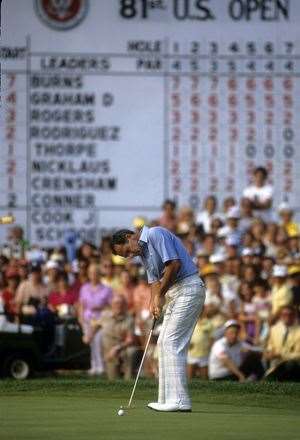 David Graham putts and watches his birdie attempt at the 72nd hole of the 1981 US Open, which he won by three strokes. PHOTO: Getty Images