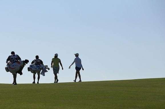 Rachel Hetherington and Karrie Webb share a joke as they walk during their round. PHOTO: Getty Images
