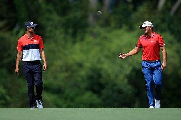 Adam Scott and Jason Day had a day of mixed fortunes and will rue some missed opportunities. PHOTO: Getty Images.