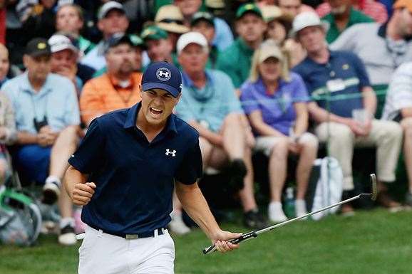 Spieth fires up after making a par-saving putt on the 16th green during the final round. PHOTO: Getty Images.