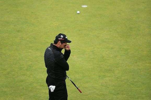 A disappointed Jason Day after leaving his birdie putt short on the 18th green, which would have seen him make the play-off. PHOTO: Jan Kruger/Getty Images.