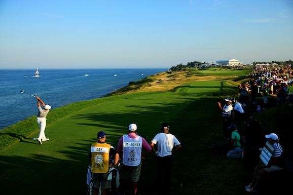 Day watches his tee shot on the 16th hole, where he would finish with a double bogey. PHOTO: David Cannon/Getty Images.