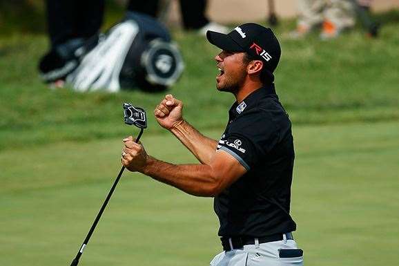 Day celebrates making a long birdie putt on the 7th hole during the final round. PHOTO: Jamie Squire/Getty Images.