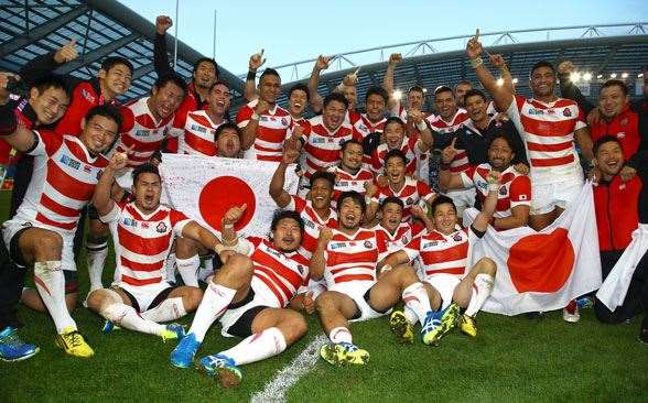 Japan celebrating their famous win over South Africa. (Getty Images)