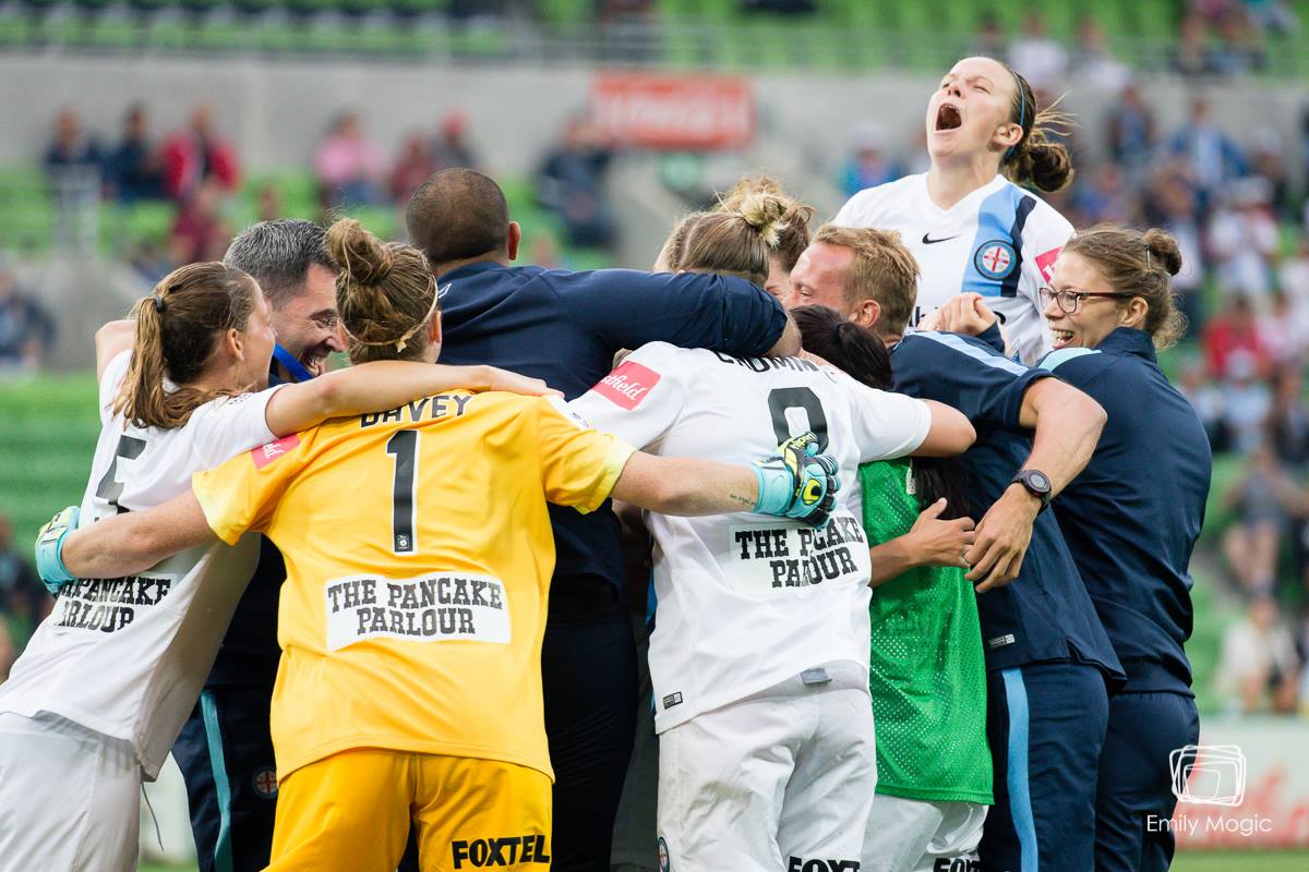 City family celebrates their semi final victory (Photo: Emily Mogic Photography)