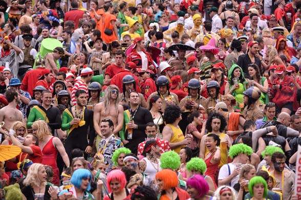 Rugby fans attend the rugby sevens tournament in Hong Kong on March 29, 2014. AFP PHOTO / Philippe Lopez (Photo credit should read PHILIPPE LOPEZ/AFP/Getty Images)