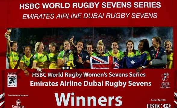 DUBAI, UNITED ARAB EMIRATES - DECEMBER 04: Australia celebrates after winning the Emirates Dubai Rugby Sevens - HSBC World Rugby Women's Sevens Series Cup Final on December 4, 2015 in Dubai, United Arab Emirates. (Photo by Francois Nel/Getty Images)
