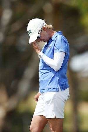 Karrie Webb shows her frustration at missing a birdie putt. PHOTO: Morne de Klerk/Getty Images. 