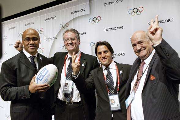 From left: New Zealand rugby player Jonah Lomu, International Rugby Board President Bernard Lapasset of France, Argentinian Rugby President Porfirio Carreras and French Rugby Federation President Pierre Camou celebrate on October 9, 2009 on the last day of the 121st IOC session in Copenhagen after the rugby union sevens was included as a sport at the 2016 Olympic Games in Rio de Janeiro. AFP PHOTO / Jens Nørgaard Larsen (Photo credit should read Jens Nørgaard Larsen/AFP/Getty Images)
