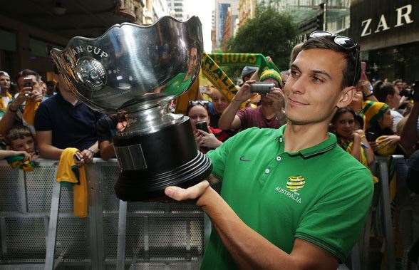Trent Sainsbury holding the Asian Cup - now with Jiangsu Suning. (Photo by Getty Images)