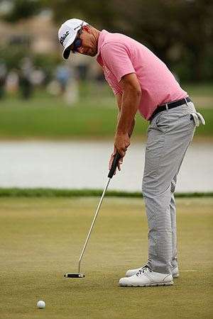 Scott's transition to a conventional putter is working well. PHOTO: Mike Ehrmann/Getty Images.