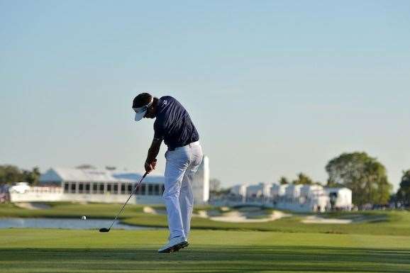 Bubba Watson tries to drive the green on the par-4 16th hole during the final round. PHOTO: Drew Hallowell/Getty Images.