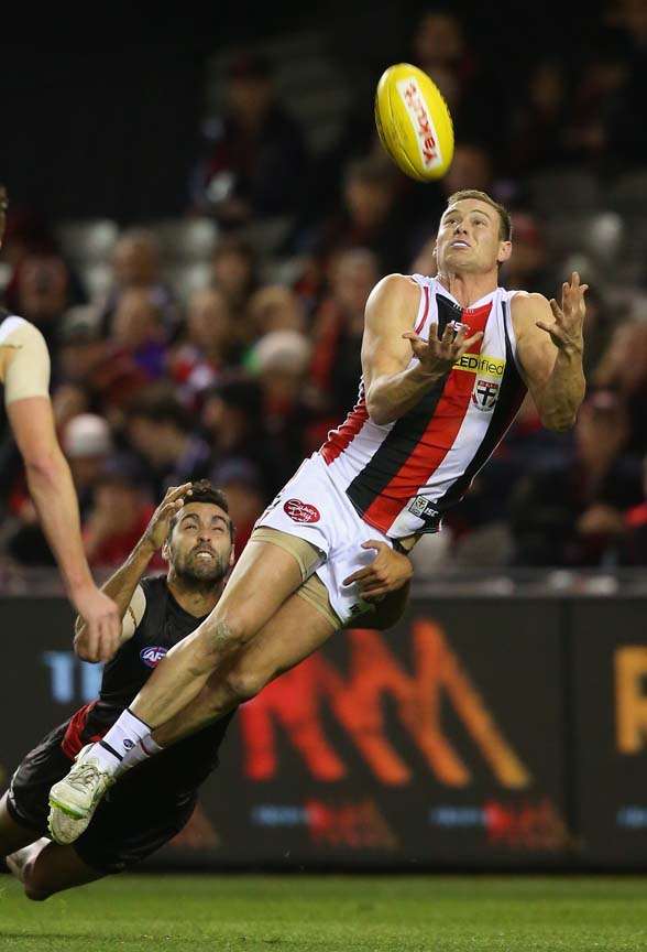 MELBOURNE, AUSTRALIA - JULY 05: David Armitage of the Saints marks infront of Courtenay Dempsey of the Bombers during the round 14 AFL match between the Essendon Bombers and the St Kilda Saints at Etihad Stadium on July 5, 2015 in Melbourne, Australia. (Photo by Quinn Rooney/Getty Images)