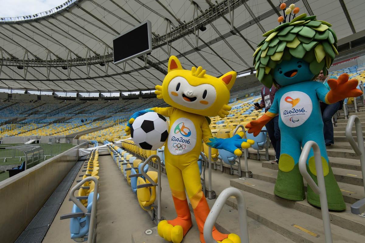 The mascots for the Rio 2016 Olympic Games (yellow) and the Rio 2016 Paralympic Games at the famous Maracana Stadium in Rio (YASUYOSHI CHIBA/AFP/Getty Images)