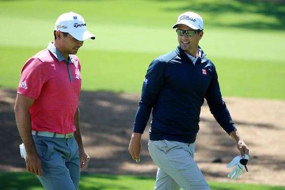 Jason Day and Adam Scott during practice at Augusta National. Both Australians have high motivations levels this week. PHOTO: Andrew Redington/Getty Images