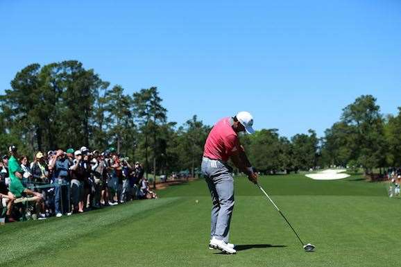Day drives off the 1st tee. He arrived at Augusta last Friday, playing mostly nine-hole practice rounds each day. PHOTO: Andrew Redington/Getty Images