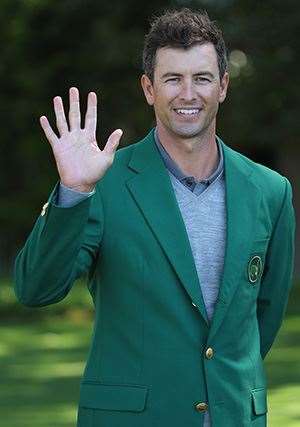 2013 Champion Adam Scott watched the Drive, Chip and Putt Championship at Augusta National Golf Club before playing a practice round alongside his father, Phil. PHOTO: Andrew Redington/Getty Images.