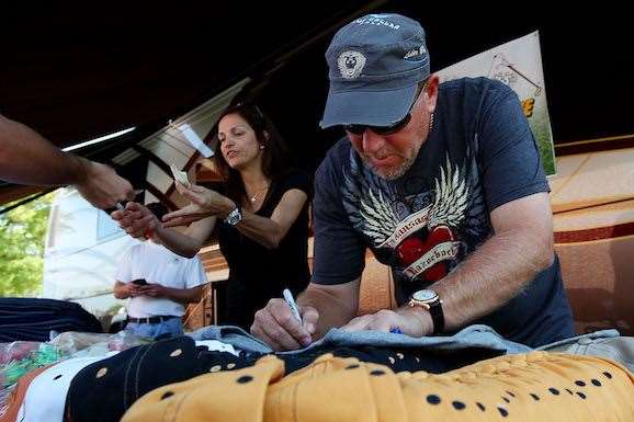John Daly and his across-the-road signing of clothing and memorabilia have became a fixture in recent Masters. This year Daly is based at the local Hooters restaurant. PHOTO: Win McNamee/Getty Images