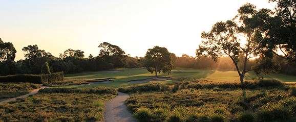 The setting sun forms a delightful backdrop to the attractive par-3 10th hole.