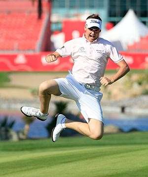 Ian Poulter enjoying the freedom of being allowed to wear shorts during a pro-am. PHOTO: David Cannon/Getty Images.