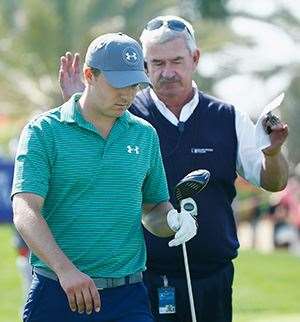 European Tour chief rules official John Paramor chats with Jordan Spieth after putting him on the clock at the Abu Dhabi HSBC Golf Championship. PHOTO: Scott Halleran/Getty Images.