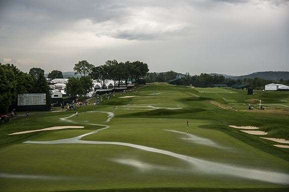 The 18th green and fairway was awash after heavy rain swept across the course. PHOTO: Keyur Khamar/PGA Tour.