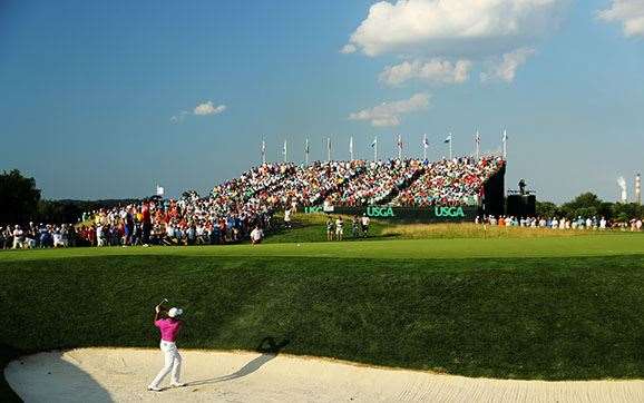 Day plays a shot from a bunker on the 17th hole. PHOTO: David Cannon/Getty Images.