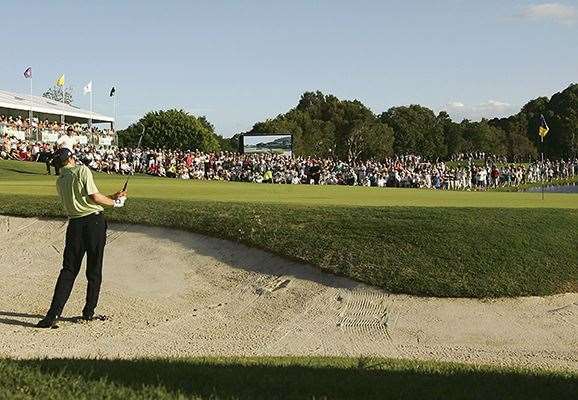 Nick O'Hern blasts out of the bunker to win the Australian PGA in 2006. PHOTO: Cameron Spencer/Getty Images.