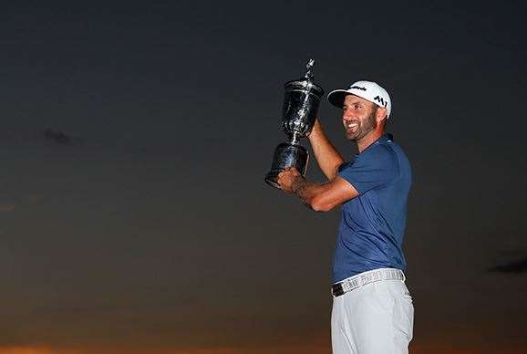 OAKMONT, PA - JUNE 19: Dustin Johnson of the United States poses with the winner's trophy after winning the U.S. Open at Oakmont Country Club on June 19, 2016 in Oakmont, Pennsylvania. (Photo by Andrew Redington/Getty Images)