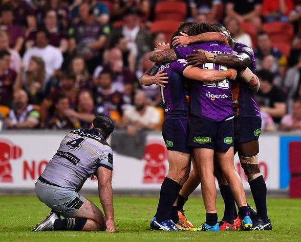 Storm players celebrate their 1 point victory in Round 10, a repeat results in Round 21 and it could signal the end of the Cowboys minor premiership hopes. (Photo by Getty Images)