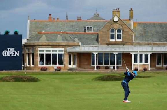 McIlroy practices on the 18th hole at Royal Troon in preparation for The Open Championship which starts on Thursday. PHOTO: Andrew Redington/Getty Images.