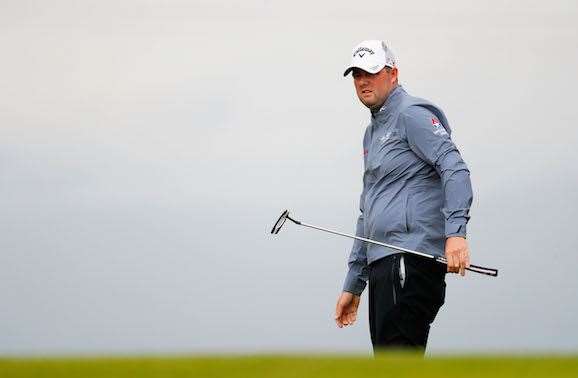 Marc Leishman played through tough conditions on Friday but still shot a two under 69. PHOTO: Kevin C. Cox/Getty Images.
