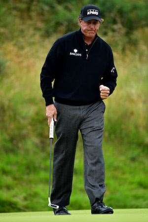 Mickelson celebrates a birdie on the 10th hole. PHOTO: Stuart Franklin/Getty Images.