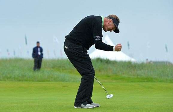 Job done! Paul Broadhurst celebrates after holing his final putt on 18 to win The Senior Open Championship. PHOTO: Mark Runnacles/Getty Images.