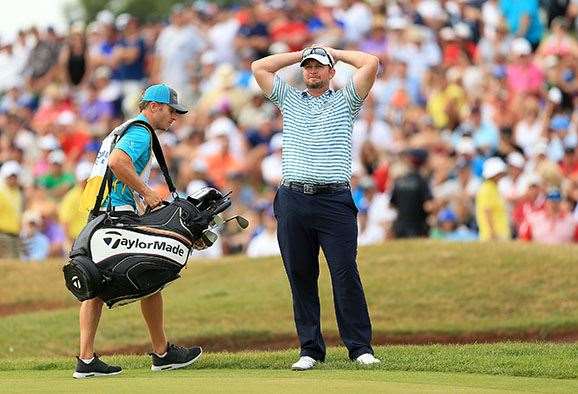 OAKVILLE, ON - JULY 24:   Steve Wheatcroft of the United States reacts to his shot that went into the water on the 18th green during the final round of the RBC Canadian Open at Glen Abbey Golf Club on July 24, 2016 in Oakville, Canada.  (Photo by Vaughn Ridley/Getty Images)