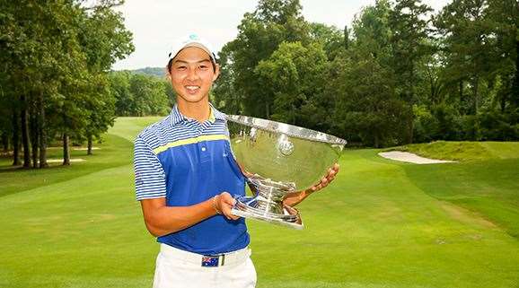 Min Woo Lee holds the trophy after the final round of match play at the U.S. Junior Amateur. PHOTO: USGA/Darren Carroll.