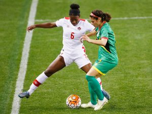 HOUSTON, TX - FEBRUARY 11: Deanne Rose #6 of Canada battles for the ball with Kayla De Souza#4 of Guyana during the 2016 CONCACAF Women's Olympic Qualifying at BBVA Compass Stadium on February 11, 2016 in Houston, Texas. (Photo by Scott Halleran/Getty Images)