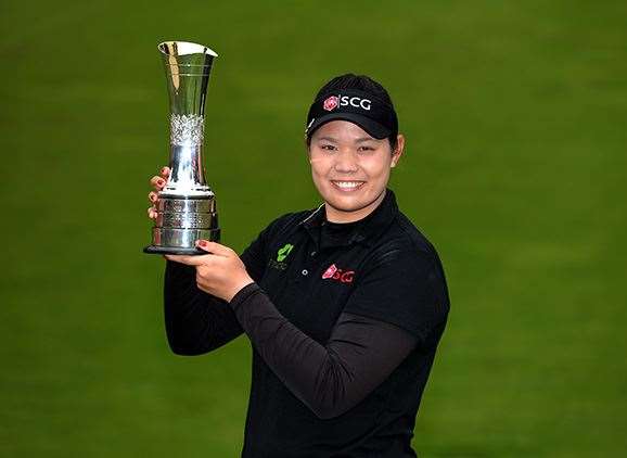 Thailand's Ariya Jutanugarn poses with the trophy after winning the Ricoh Women's British Open. PHOTO: Tony Marshall/Getty Images.