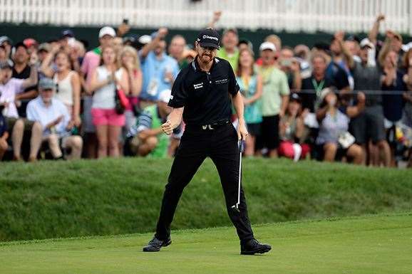 Walker's clutch birdie on the par-5 17th proved to be the difference, giving him a one-shot buffer over Day. PHOTO: Andy Lyons/Getty Images.