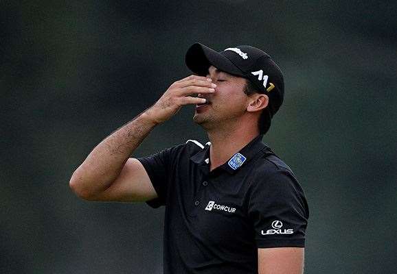 Day reacts to a missed birdie putt on the 17th hole. PHOTO: Stuart Franklin/Getty Images.