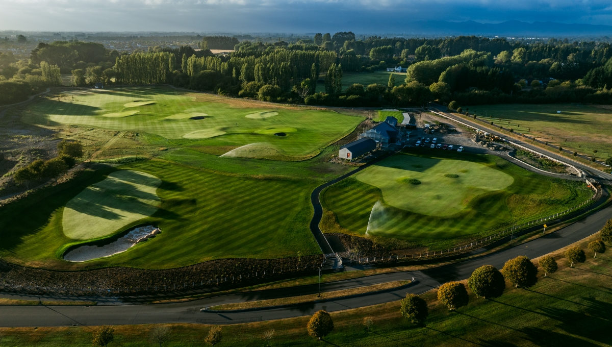 The Sir Bob Charles Centre at Clearwater Golf Club Christchurch showing the new state of the art practice facility with the 3500 square metre putting green driving range and TrackMan technology bays