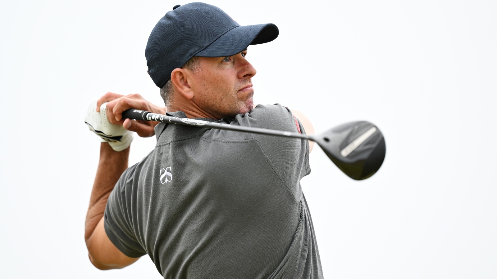 Scott fires at Troon but Day cools as rain falls